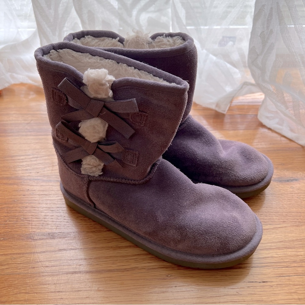 Stylist pastel purple Koolaburra by UGG boots with super cute bows on the side!